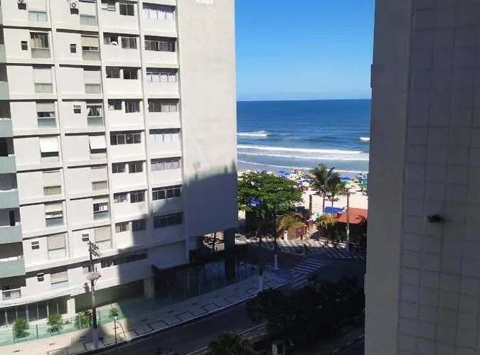 Apto a 25 metros areia PITANGUEIRAS Vista mar 4 quartos 3 banheiros 1 vaga carro Serviço de praia Guarujá